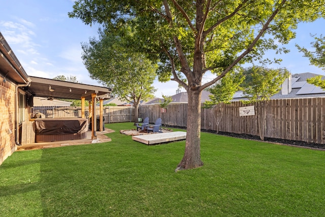 8121 Kathleen Dr, Fort Worth, TX 76137 - view of yard featuring a hot tub, a wooden deck, a fenced backyard, and a ceiling fan