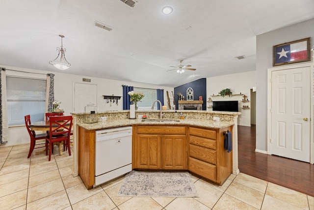 8121 Kathleen Dr, Fort Worth, TX 76137 - kitchen featuring ceiling fan, visible vents, white dishwasher, a sink, and light tile patterned flooring