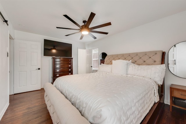 bedroom with baseboards, ceiling fan, and wood finished floors