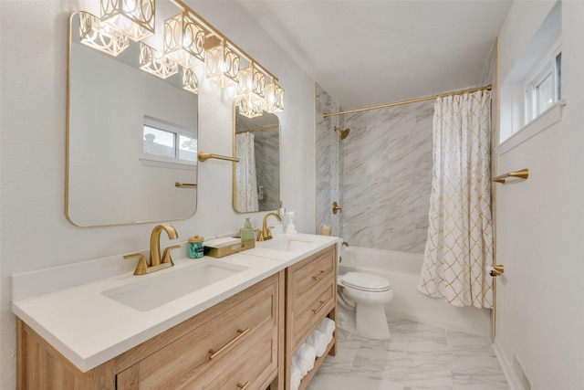 full bathroom with toilet, shower / bath combination with curtain, a sink, and marble finish floor