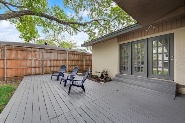 wooden deck with fence and entry steps