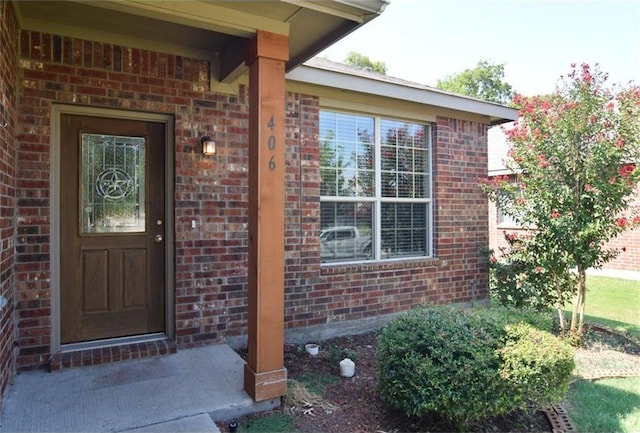 406 Fisherman Trl, Melissa, TX 75454 - doorway to property with brick siding