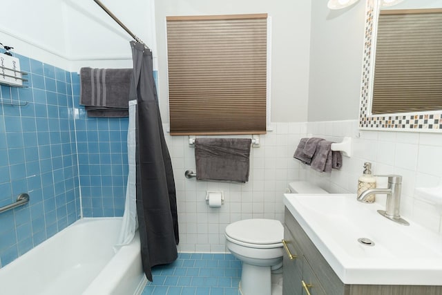 full bathroom featuring tile patterned flooring, shower / tub combo with curtain, toilet, and tile walls