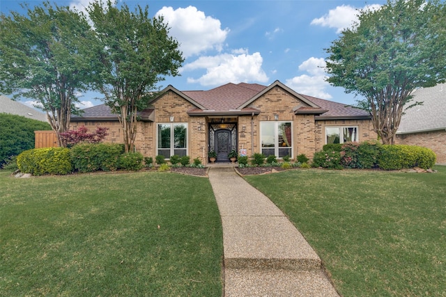 2516 Nighthawk Dr, Plano, TX 75025 - single story home featuring brick siding, a shingled roof, and a front lawn