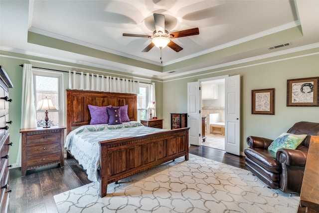 2516 Nighthawk Dr, Plano, TX 75025 - bedroom with a raised ceiling, ornamental molding, hardwood / wood-style flooring, and visible vents