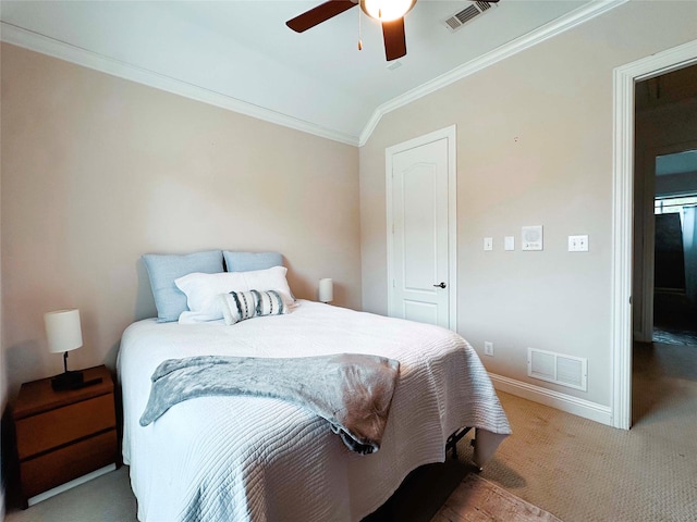 bedroom with lofted ceiling, carpet, crown molding, baseboards, and ceiling fan