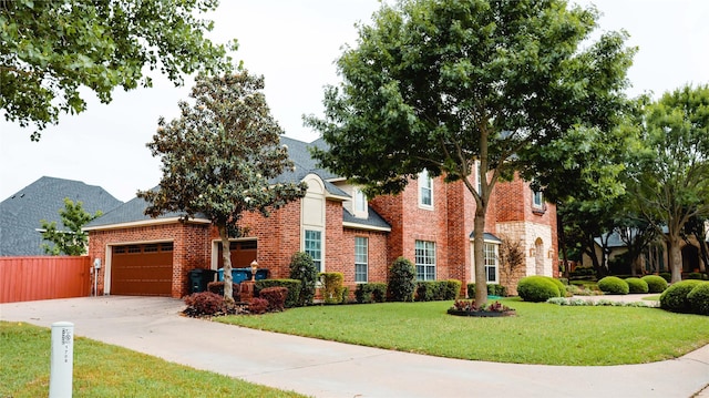 view of front of home featuring brick siding, concrete driveway, and a garage