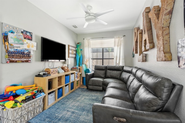 living area with carpet, a ceiling fan, and visible vents