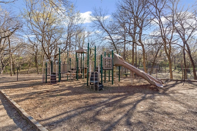 communal playground featuring fence