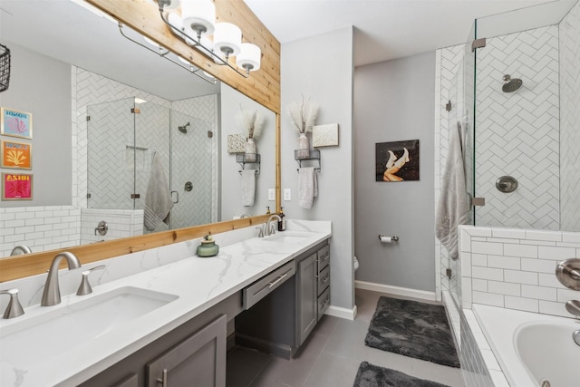 full bathroom with a relaxing tiled tub, a sink, double vanity, and a shower stall