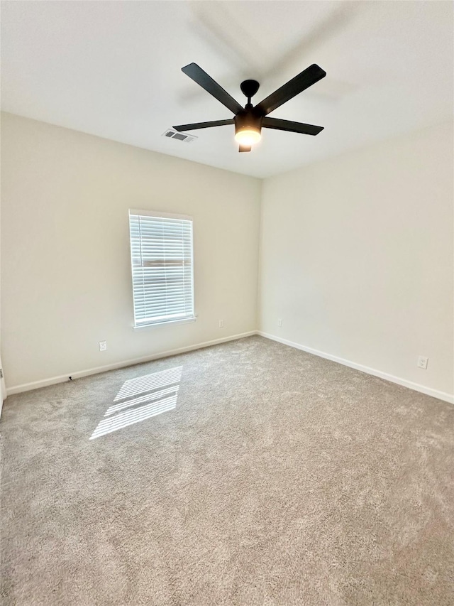 303 Third, Lindsay, TX 76250 - carpeted spare room with baseboards, ceiling fan, and visible vents