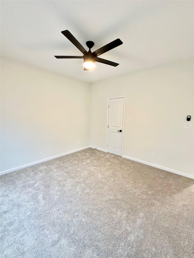 303 Third, Lindsay, TX 76250 - carpeted empty room featuring baseboards and a ceiling fan