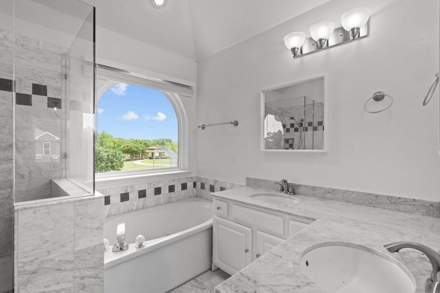 full bath featuring a bath, a shower stall, a sink, and marble finish floor