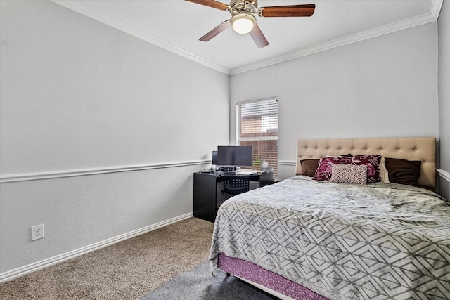 carpeted bedroom featuring baseboards, ornamental molding, and ceiling fan