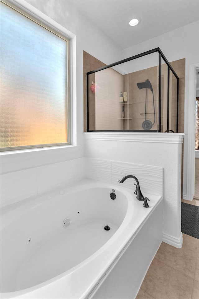 2317 Willard Dr, Mckinney, TX 75072 - bathroom featuring tile patterned flooring, a jetted tub, and a shower