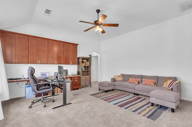 2317 Willard Dr, Mckinney, TX 75072 - office area with a ceiling fan, light colored carpet, vaulted ceiling, arched walkways, and built in study area