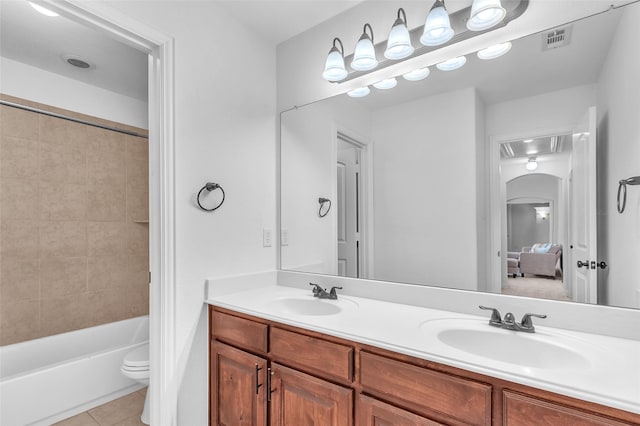 2317 Willard Dr, Mckinney, TX 75072 - bathroom featuring tile patterned floors, double vanity, toilet, and shower / bath combination