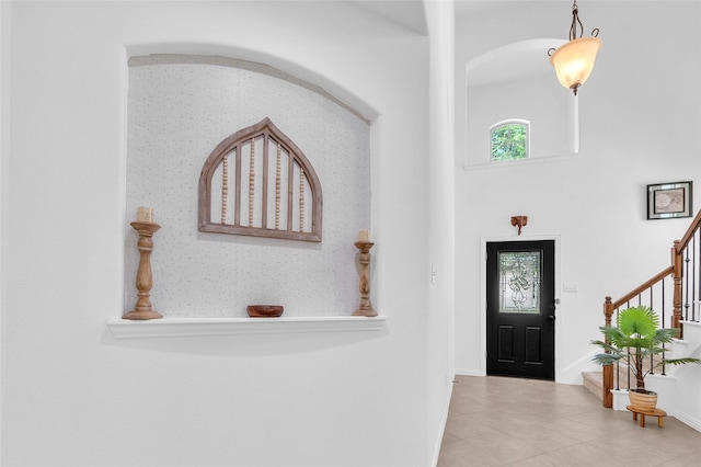 2317 Willard Dr, Mckinney, TX 75072 - tiled entrance foyer with stairs and baseboards