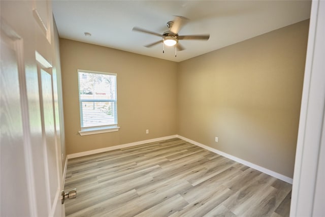 1224 W Bewick St, Fort Worth, TX 76110 - empty room featuring a ceiling fan, light wood-style flooring, and baseboards