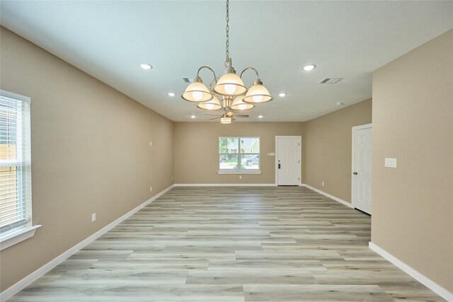 1224 W Bewick St, Fort Worth, TX 76110 - unfurnished dining area with a chandelier, baseboards, light wood-type flooring, and recessed lighting