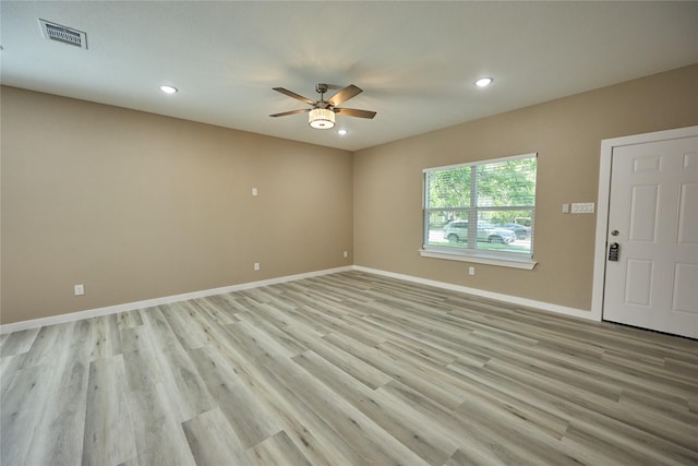 1224 W Bewick St, Fort Worth, TX 76110 - spare room featuring a ceiling fan, recessed lighting, light wood-style flooring, and baseboards