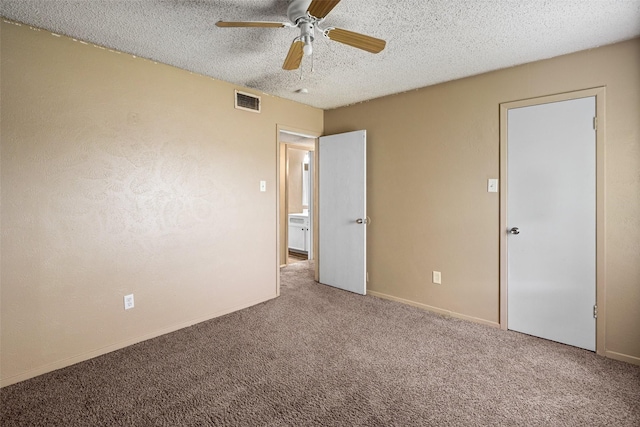 628 Evelyn Ln, Burleson, TX 76028 - unfurnished bedroom with ceiling fan, a textured ceiling, visible vents, baseboards, and carpet flooring