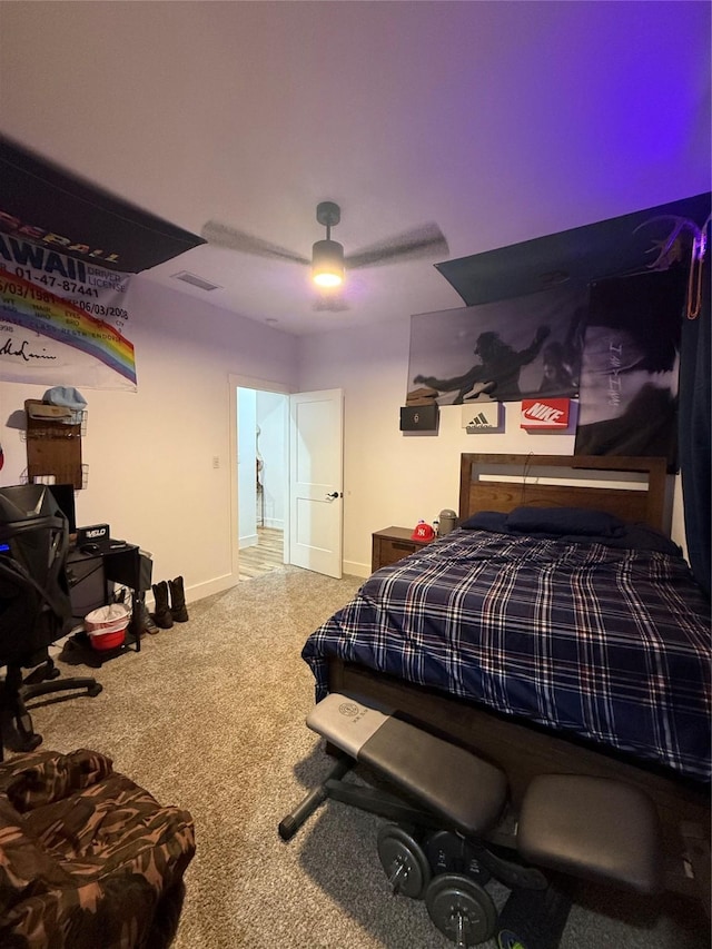 bedroom featuring carpet flooring, baseboards, and ceiling fan
