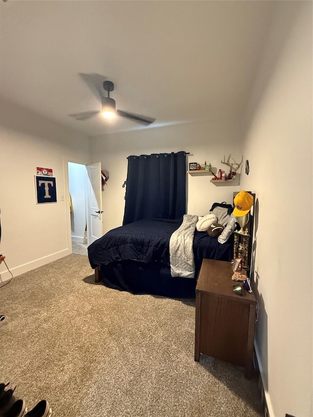 bedroom with carpet flooring, ceiling fan, and baseboards
