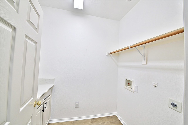 2328 Twilight Star Dr, Little Elm, TX 75068 - laundry area with hookup for an electric dryer, light wood finished floors, baseboards, washer hookup, and gas dryer hookup