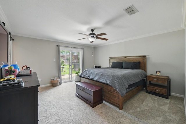 bedroom with crown molding, carpet floors, access to outside, and visible vents