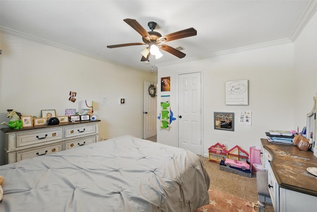 carpeted bedroom with crown molding and ceiling fan