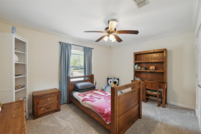 bedroom with crown molding, a ceiling fan, visible vents, and light carpet
