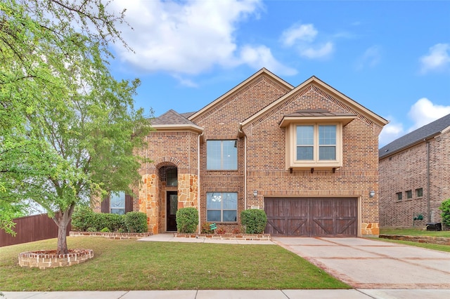 3020 Nyala Trl, Frisco, TX 75034 - traditional home featuring a garage, a front lawn, fence, brick siding, and driveway