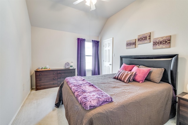 carpeted bedroom with baseboards, ceiling fan, and lofted ceiling
