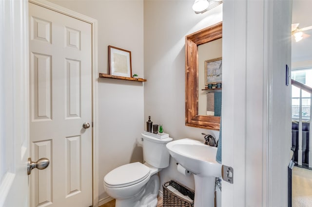 half bathroom with toilet