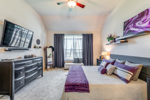 carpeted bedroom featuring ceiling fan and lofted ceiling