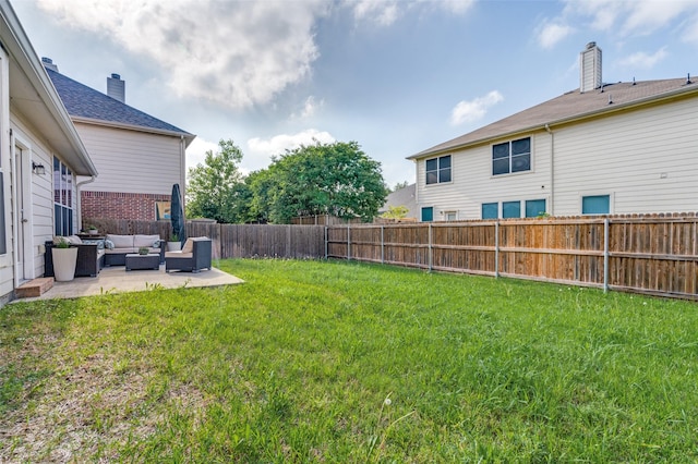 view of yard with a patio, a fenced backyard, and an outdoor hangout area