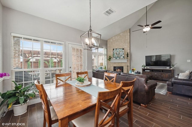 13283 Bodega Trl, Frisco, TX 75035 - dining space featuring visible vents, dark wood-type flooring, a wealth of natural light, and high vaulted ceiling
