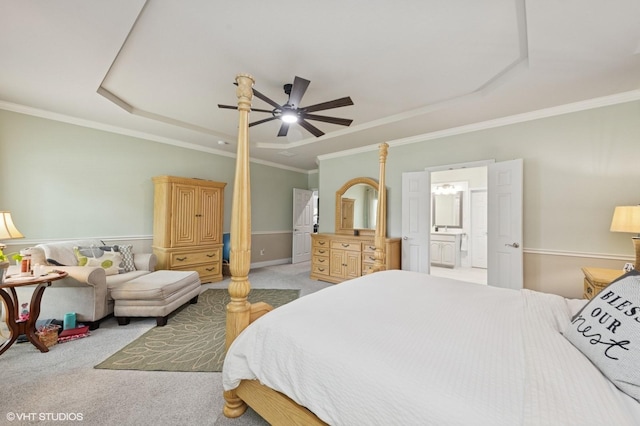 13283 Bodega Trl, Frisco, TX 75035 - bedroom with crown molding, light carpet, ensuite bathroom, a raised ceiling, and a ceiling fan