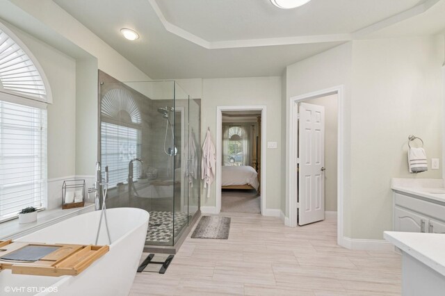 13283 Bodega Trl, Frisco, TX 75035 - ensuite bathroom with vanity, a freestanding bath, a stall shower, and ensuite bathroom