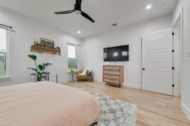 bedroom featuring recessed lighting, baseboards, light wood finished floors, and visible vents