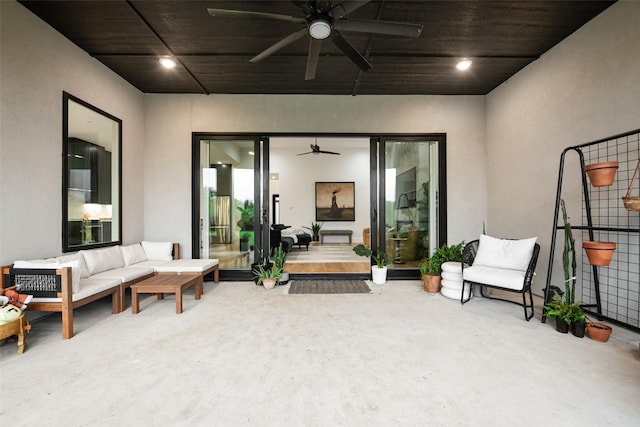 view of patio / terrace with a ceiling fan and an outdoor living space