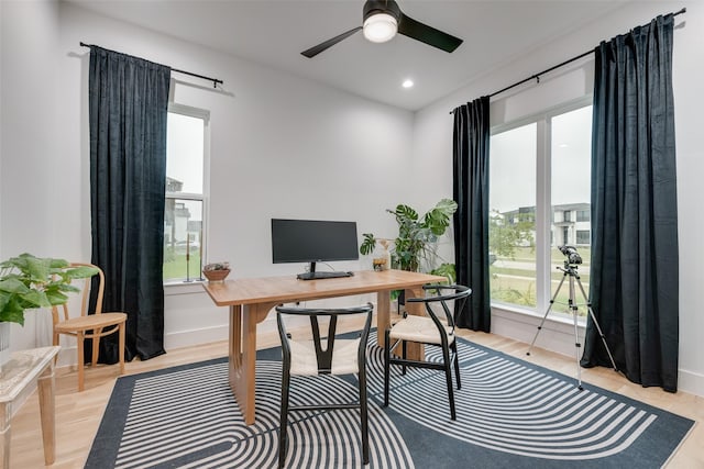 office space with a ceiling fan, baseboards, recessed lighting, and light wood finished floors