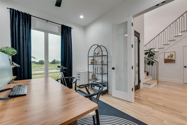 office featuring baseboards, recessed lighting, and wood finished floors