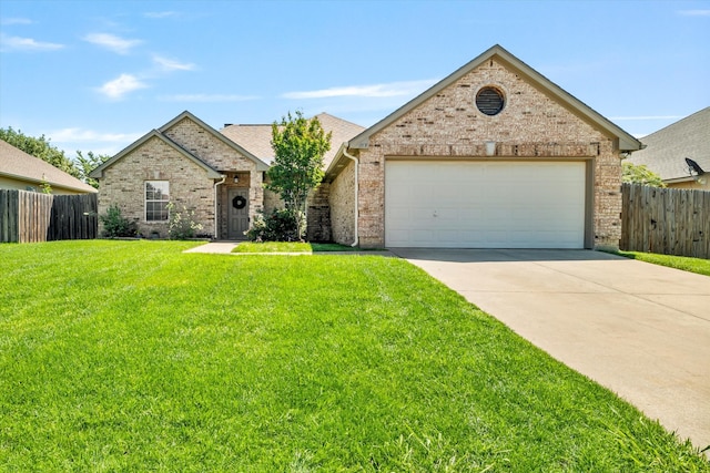 817 Countryside Dr, Aubrey, TX 76227 - view of front of house with driveway, brick siding, and a garage