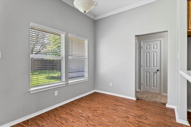 817 Countryside Dr, Aubrey, TX 76227 - empty room with crown molding, wood finished floors, and baseboards