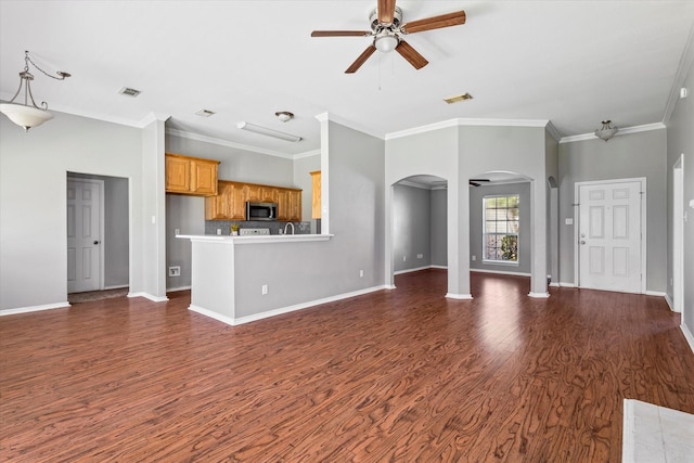 817 Countryside Dr, Aubrey, TX 76227 - unfurnished living room with arched walkways, a ceiling fan, dark wood-type flooring, baseboards, and crown molding