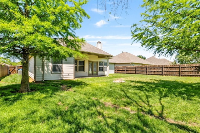 817 Countryside Dr, Aubrey, TX 76227 - back of house featuring a chimney