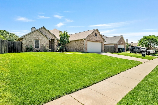 817 Countryside Dr, Aubrey, TX 76227 - view of front facade featuring concrete driveway, brick siding, an attached garage, and a chimney