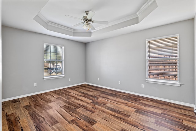 817 Countryside Dr, Aubrey, TX 76227 - unfurnished room with crown molding, a tray ceiling, wood finished floors, a ceiling fan, and baseboards